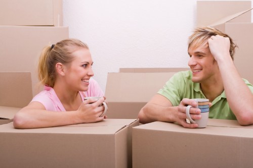 Movers handling furniture carefully in a Bayswater residential property