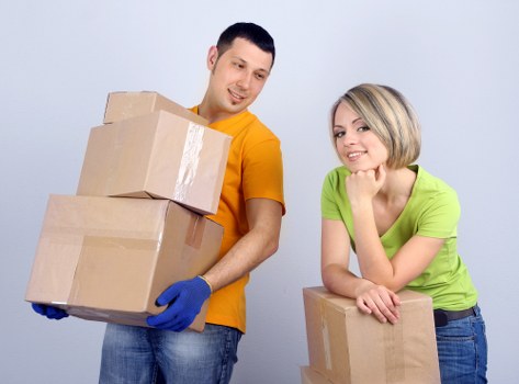 Local Bayswater removals team loading furniture into a van