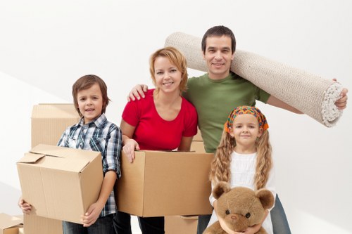Packed office boxes and furniture ready for transport in Bayswater