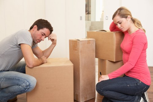 Packed boxes and furniture secured inside a removal van