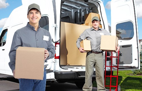 Boxes and furniture being loaded for a Bayswater apartment relocation